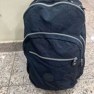 Challenger Kipling Backpack medium dark blue measurement 13 width by 17 length.
